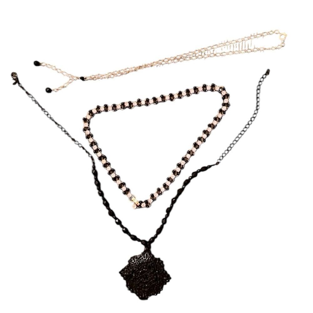 3 necklaces in black, black and gold, black and white colored EUC